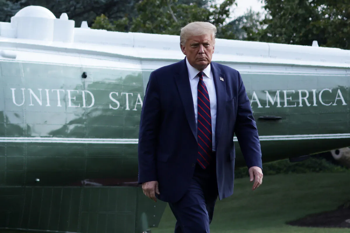President Donald Trump walks on the South Lawn after he landed aboard Marine One at the White House on July 27, 2020. (Alex Wong/Getty Images)