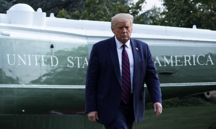 President Donald Trump walks on the South Lawn after he landed aboard Marine One at the White House on July 27, 2020. (Alex Wong/Getty Images)