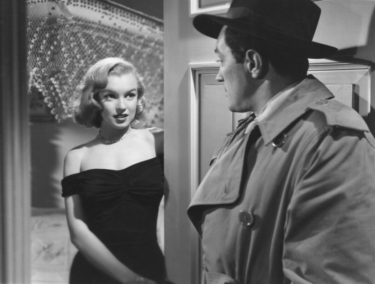 Marilyn Monroe in the film noir classic "The Asphalt Jungle." It was her big break into Hollywood. From the May 1961 issue of TV-Radio Mirror. (Public Domain)