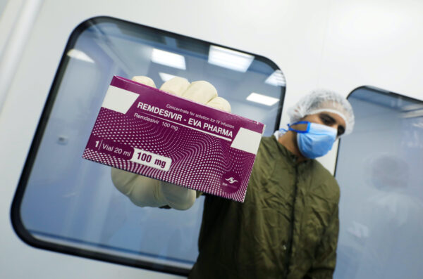 A lab technicians holds the coronavirus disease (COVID-19) treatment drug "Remdesivir"