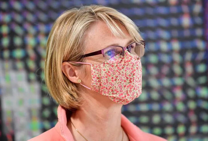 German Minister of Education and Research Anja Karliczek gets information about the coronavirus disease (COVID-19) research at the German Center for Neurodegenerative Diseases (DZNE) in Bonn, Germany, on May 18, 2020. (Martin Meissner/Pool via Reuters)