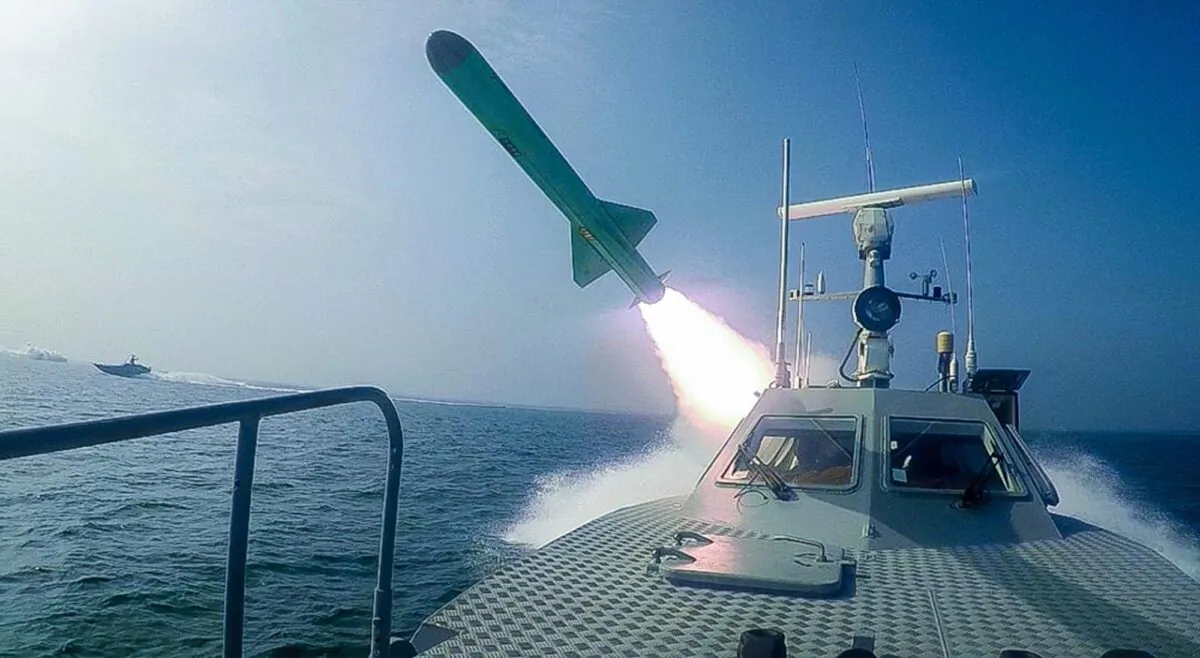A Revolutionary Guard's speedboat fires a missile during a military exercise in Iran on July 28, 2020. (Sepahnews via AP)