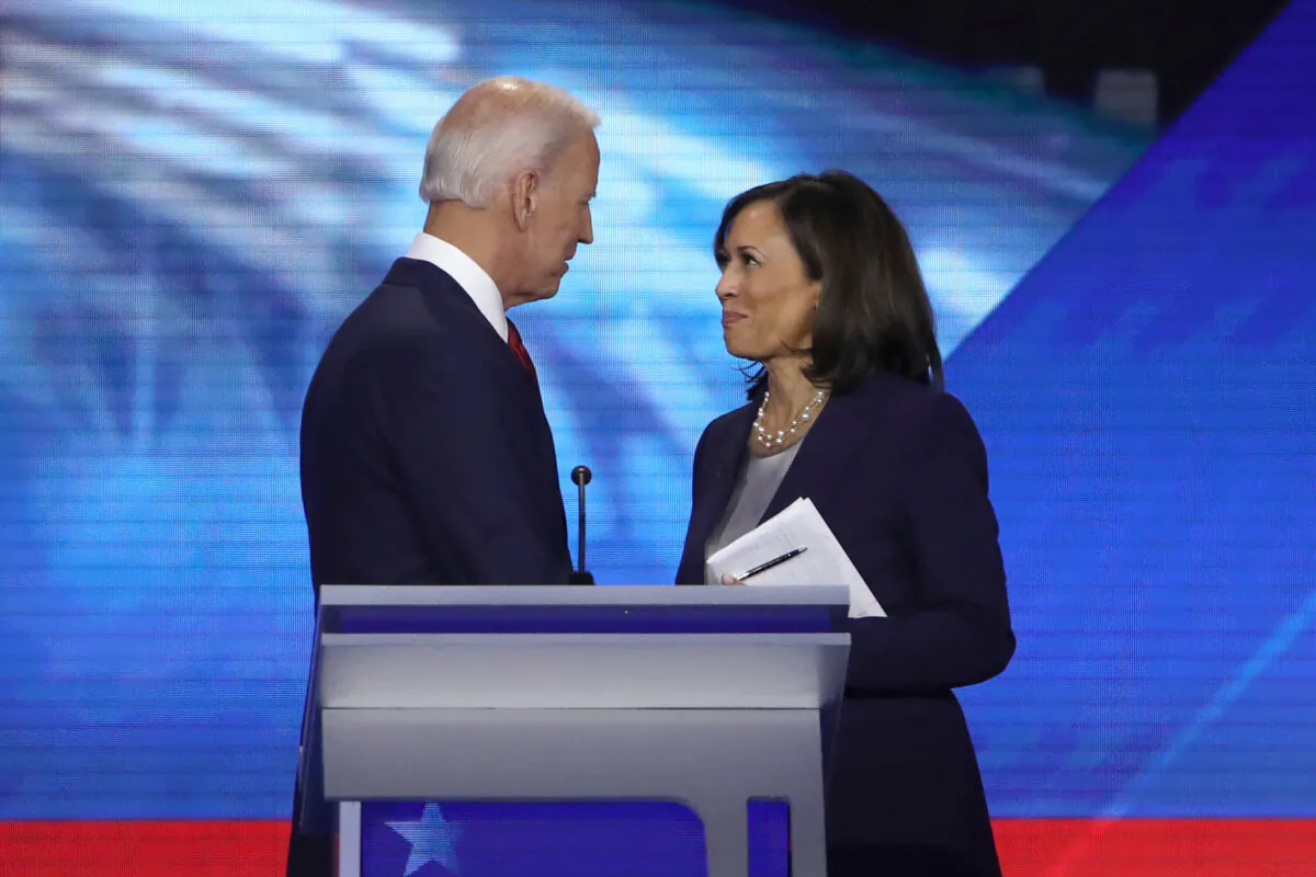 Former Vice President Joe Biden and Sen. Kamala Harris (D-Calif.) speak after a Democratic presidential candidate in Houston, Texas, on Sept. 12, 2019. (Win McNamee/Getty Images)