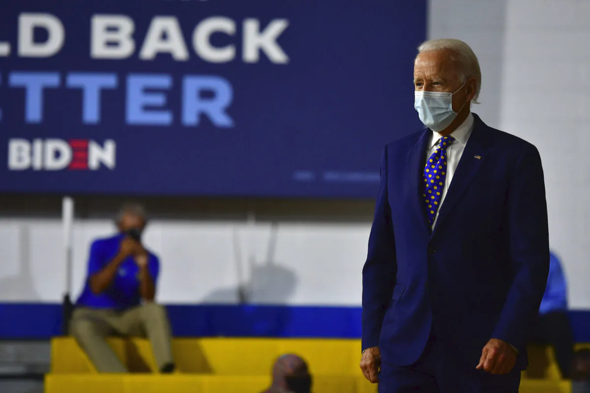 Presumptive Democratic presidential nominee former Joe Biden wears a mask when arriving to deliver a speech at the William “Hicks” Anderson Community Center, on July 28, 2020 in Wilmington, Delaware. (Mark Makela/Getty Images)