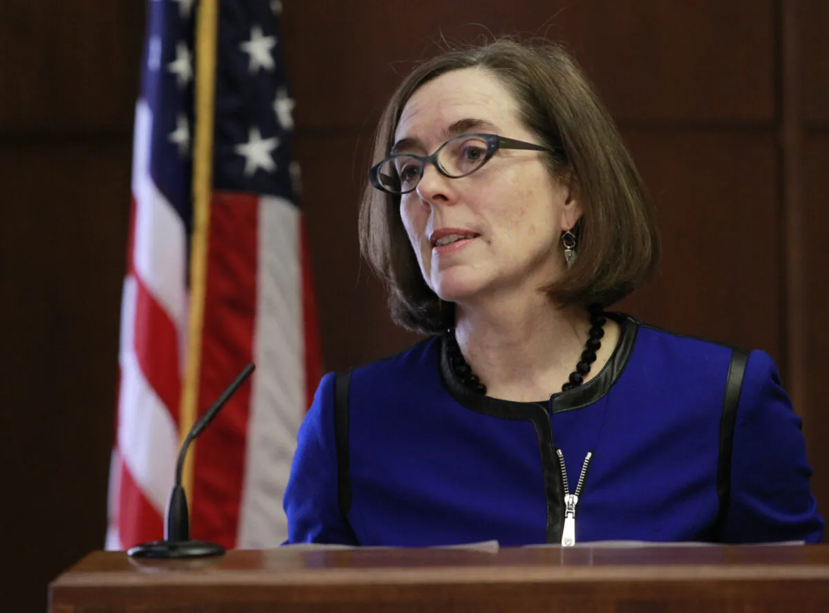 Oregon Gov. Kate Brown speaks at the state capital building in Salem, Ore., on Feb. 20, 2015. (Steve Dipaola/Reuters)