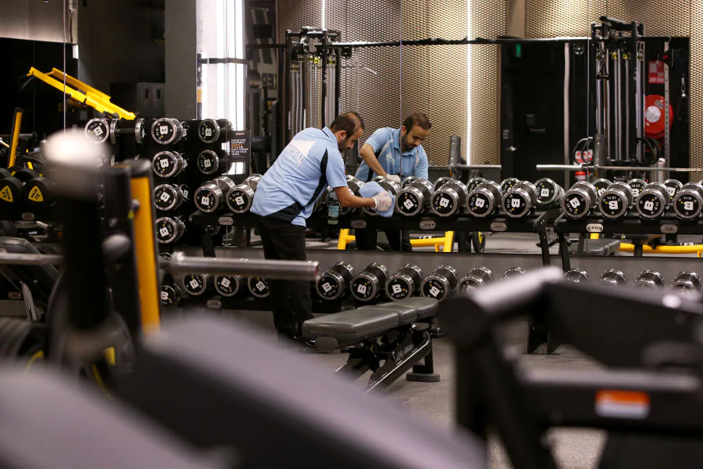 Utku Doganay of Principal Asset Services cleaning staff performs a deep clean of 'The Bunker by Fitness Playground' as it prepares to reopen to the public on June 12, 2020 in Sydney, Australia. (Lisa Maree Williams/Getty Images)