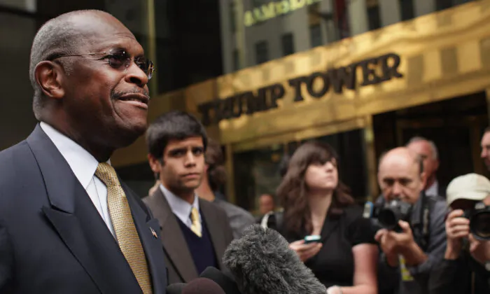 Republican presidential candidate Herman Cain speaks to the media outside of Trump Towers before a scheduled appearance with real estate mogul Donald Trump in New York City, N.Y., on Oct. 3, 2011. (Spencer Platt/Getty Images)