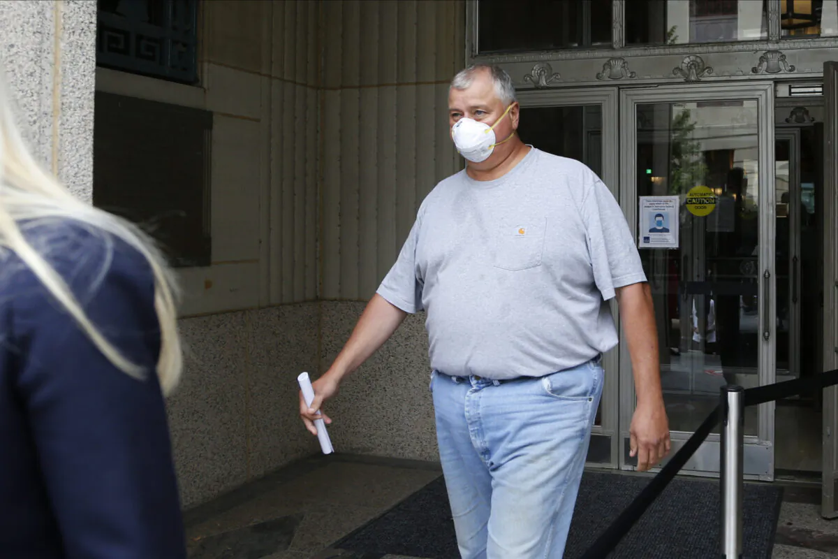 Ohio House Speaker Larry Householder leaves the federal courthouse after an initial hearing following charges against him and four others alleging a $60 million bribery scheme, in Columbus, Ohio, on July 21, 2020. (Jay LaPrete/AP Photo)