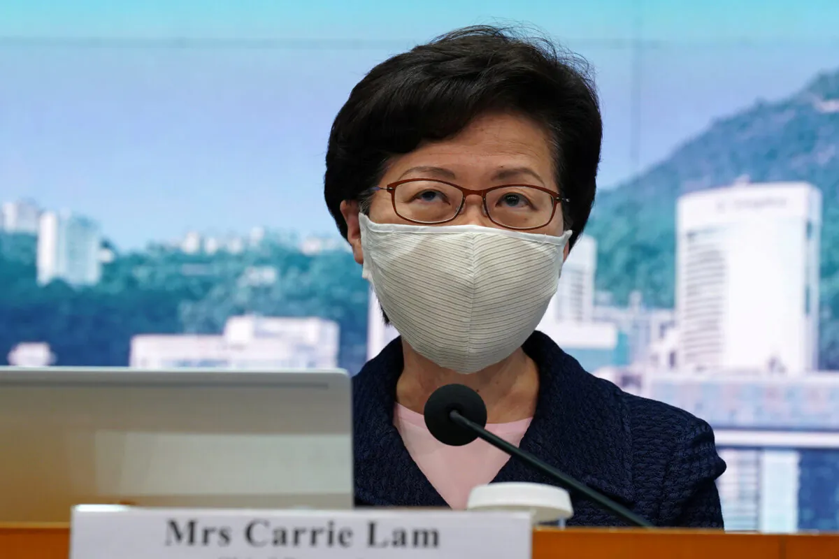 Hong Kong Chief Executive Carrie Lam, wearing a face mask following the coronavirus disease (COVID-19) outbreak, attends a news conference in Hong Kong, China on July 31, 2020. (Lam Yik/Reuters)