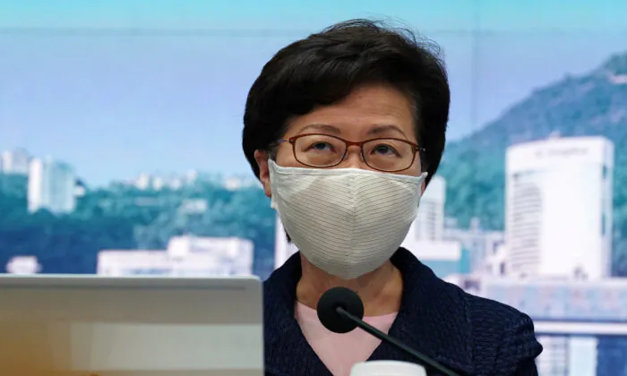 Hong Kong Chief Executive Carrie Lam, wearing a face mask following the coronavirus disease (COVID-19) outbreak, attends a news conference in Hong Kong, China on July 31, 2020. (Lam Yik/Reuters)