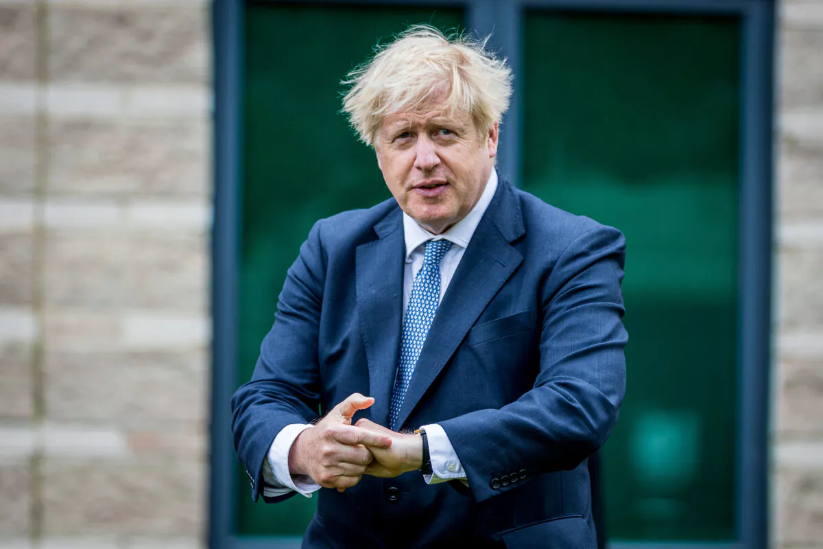 UK Prime Minster Boris Johnson visits the North Yorkshire police and is introduced to recently graduated police officers on July 30, 2020, in Northallerton, North Yorkshire, England. (Charlotte Graham/WPA Pool/Getty)