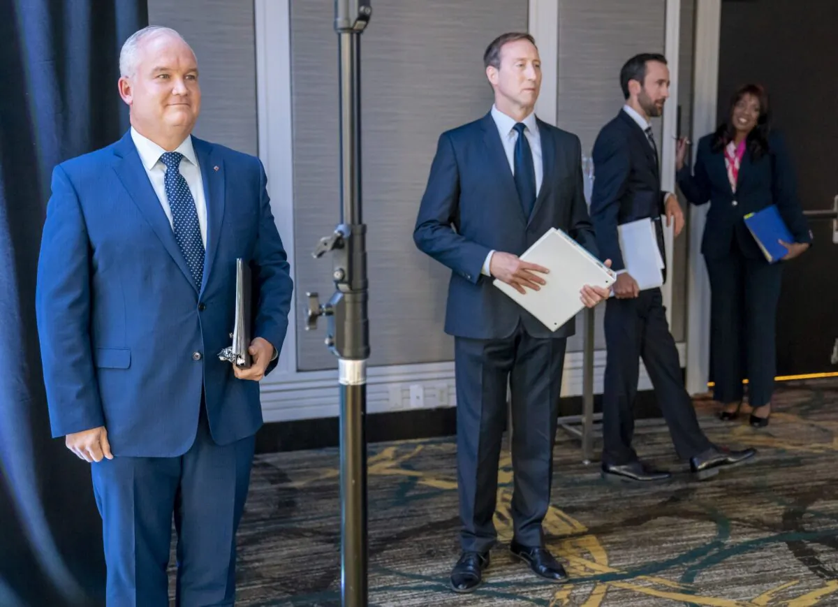 (L-R) Conservative Party of Canada leadership candidates Erin O'Toole, Peter MacKay, Derek Sloan, and Leslyn Lewis wait for the start of the French Leadership Debate in Toronto on June 17, 2020. (The Canadian Press/Frank Gunn)