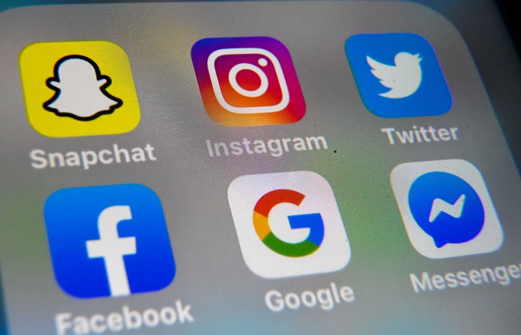 The logo of mobile app Instagram, Snapchat, Twitter, Facebook, Google, and Messenger are displayed on a tablet in Lille, France, on Oct. 1, 2019. (Denis Charlet /Getty Images)