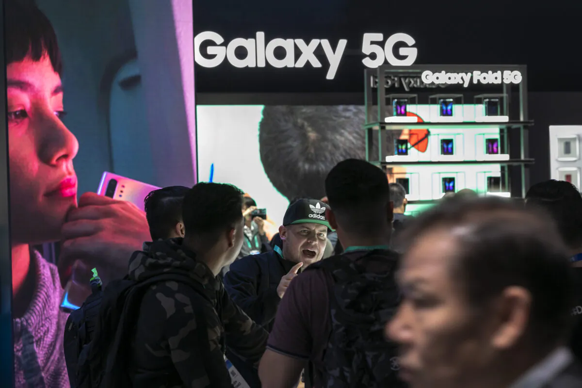 People look at 5G Samsung products during the 2020 Consumer Electronics Show (CES) in Las Vegas, Nev., on Jan. 8, 2020. (David McNew/AFP via Getty Images)