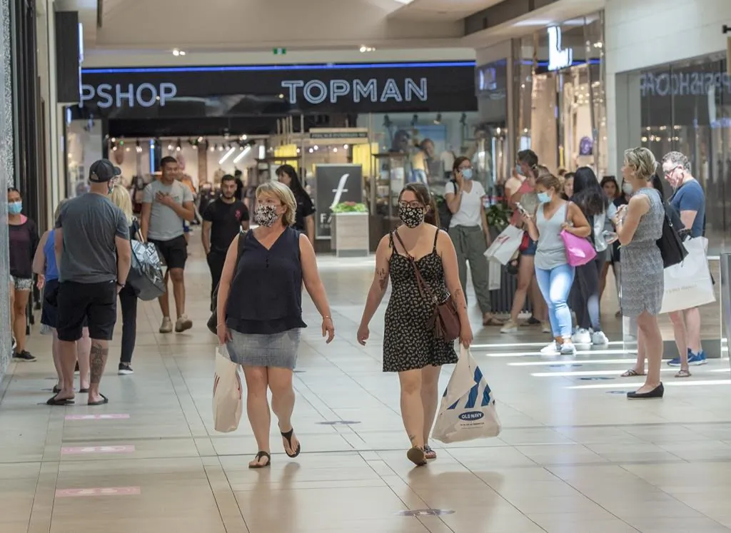 People at a shopping centre in Laval, Que., on June 19, 2020. As calls for a universal basic income have ramped up amid the pandemic, a new report outlines how much it could cost. (Ryan Remiorz/The Canadian Press)
