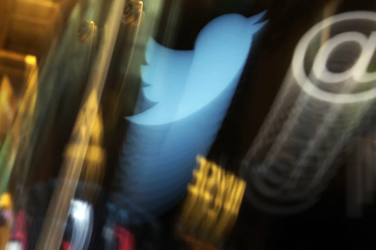 The Twitter logo appears on an updated phone post on the floor of the New York Stock Exchange on Nov. 6, 2013. (Richard Drew/AP Photo)