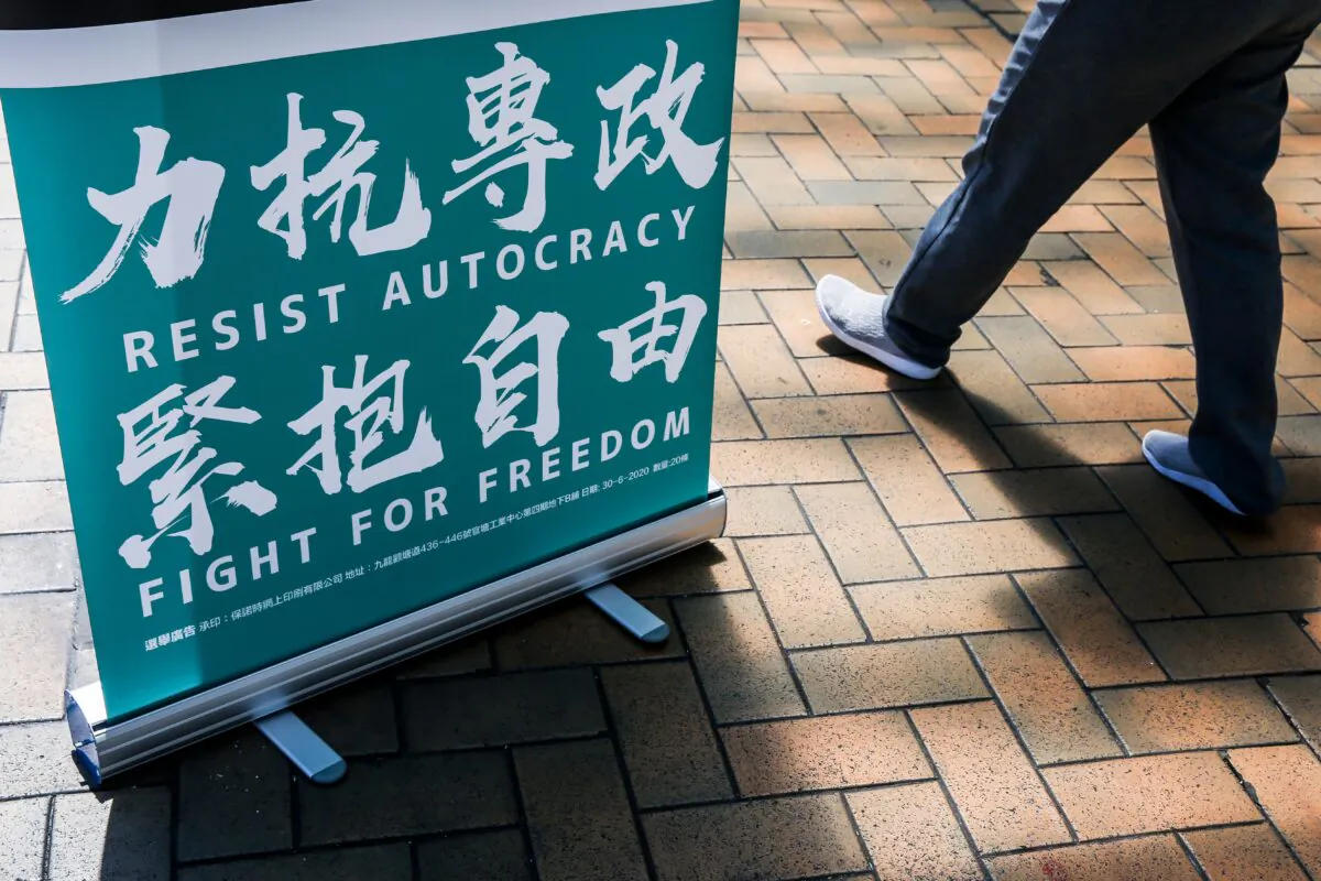 A sign is set up at a campaign location during primary elections in Hong Kong on July 12, 2020. (Isaac Lawrence/AFP via Getty Images)