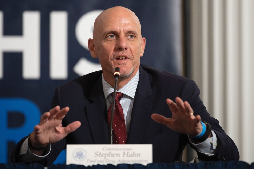 U.S. Commissioner of Food and Drugs Stephen Hahn participates in a roundtable discussion on donating plasma at the American Red Cross National Headquarters in Washington on July 30, 2020. (Jim Watson/AFP via Getty Images)