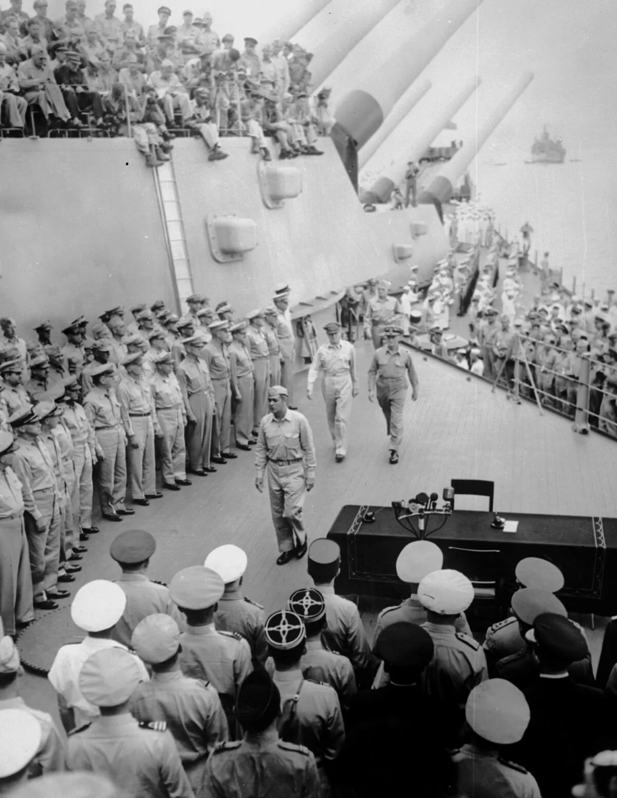 American army and navy service members aboard the USS Missouri for the surrender ceremonies to mark the end of the war with Japan, on Sept. 2, 1945. (Three Lions/Getty Images)