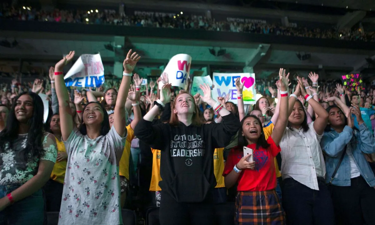 The crowd reacts during WE Day in Toronto on Sept. 19, 2019. (The Canadian Press/Chris Young)