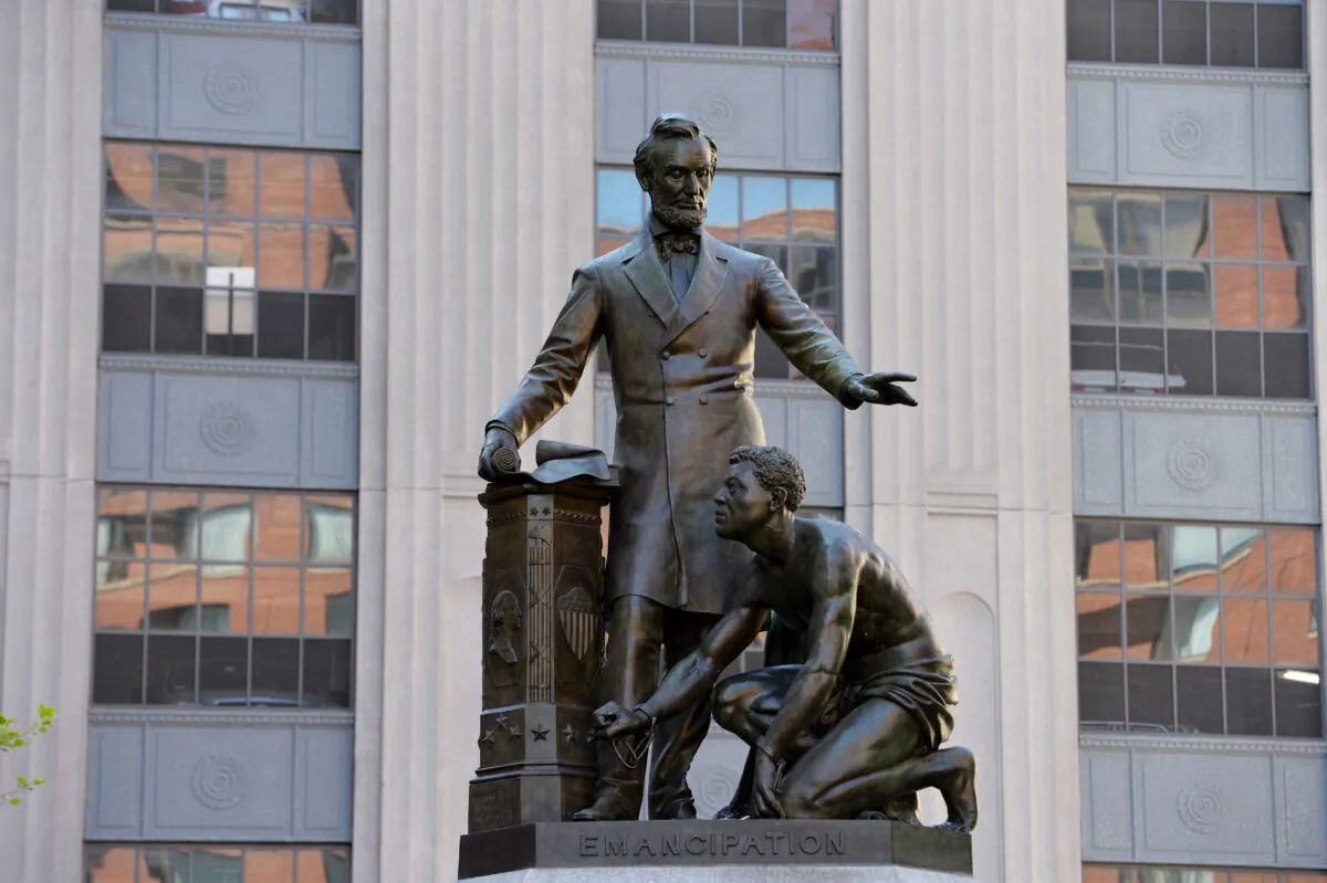 The Abraham Lincoln Statue, erected in 1879, by Thomas Ball, is viewed in Park Square in Boston, Mass., on June 16, 2020. (Joseph Prezioso/AFP via Getty Images)