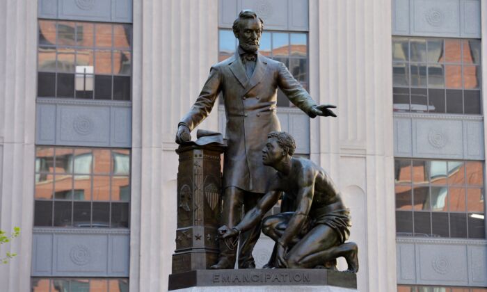 The Abraham Lincoln Statue, erected in 1879, by Thomas Ball, is viewed in Park Square in Boston, Mass., on June 16, 2020. (Joseph Prezioso/AFP via Getty Images)