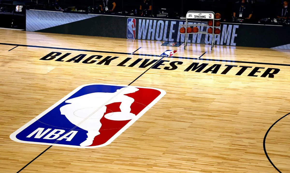 An overview of the basketball court shows the NBA logo and Black Lives Matter before the start of a game at HP Field House at ESPN Wide World of Sports Complex in Lake Buena Vista, Fla., on Aug. 1, 2020. (Kevin C. Cox/Getty Images)