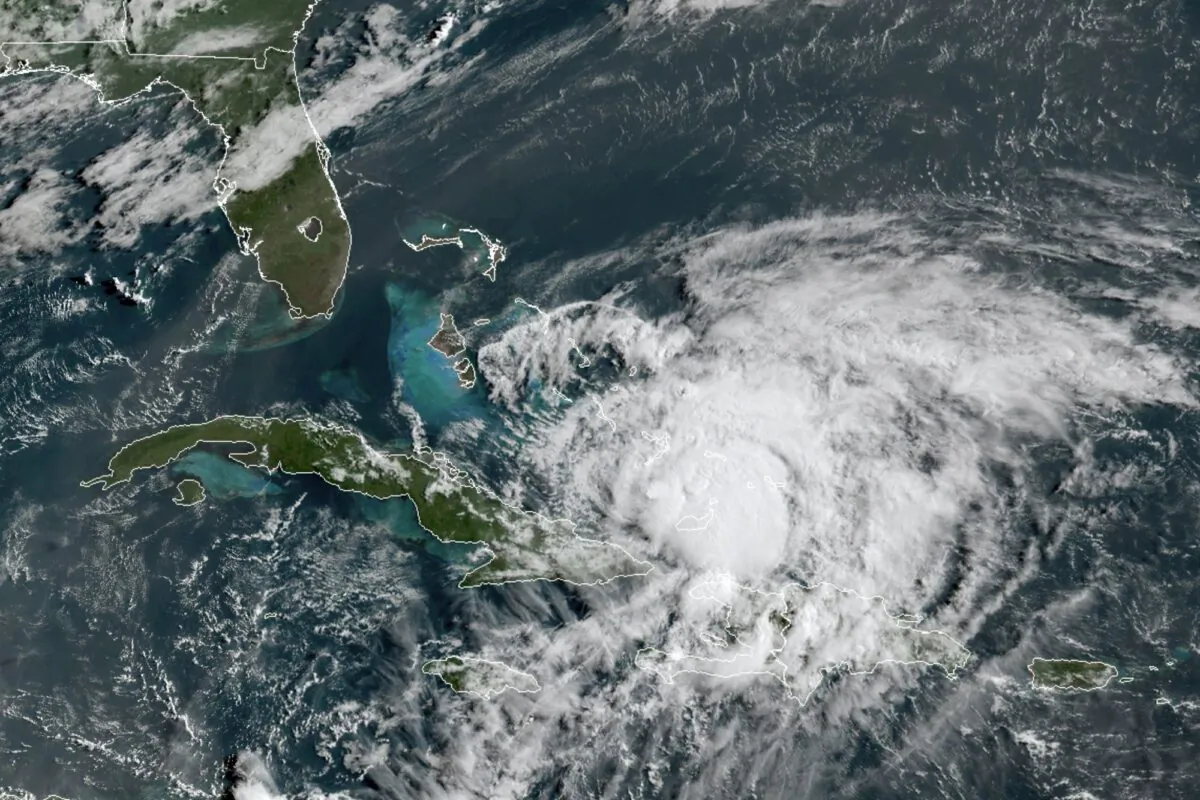 In this GOES-16 satellite image taken Friday, July 31, 2020, at 8:40 a.m. EDT., and provided by NOAA, Hurricane Isaias churns in the Caribbean. (NOAA via AP)