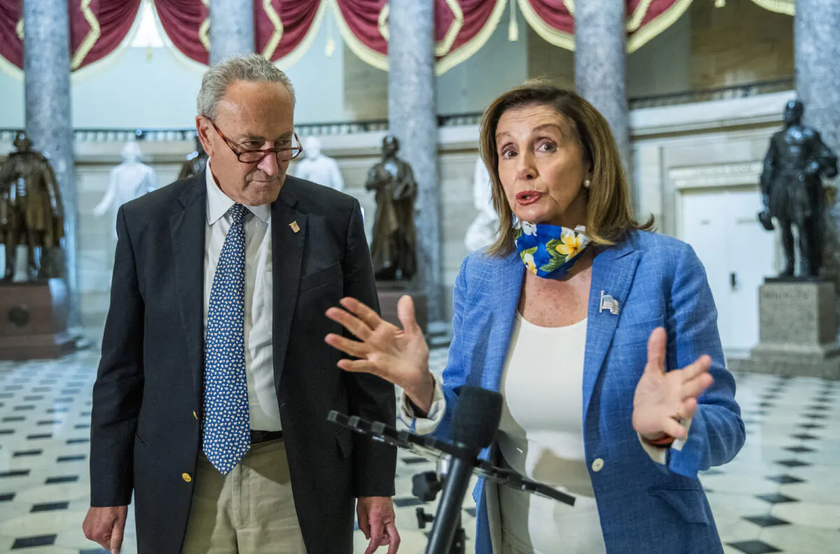 House Speaker Nancy Pelosi (D-Calif.), with Senate Minority Leader Chuck Schumer (D-N.Y.), speaks to reporters at the Capitol in Washington on Aug. 1, 2020. (Manuel Balce Ceneta/AP Photo)