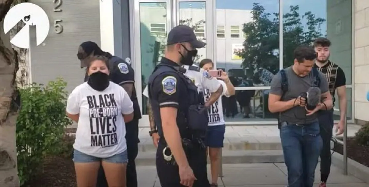 A Student for Life team member, left, is arrested by Metropolitan Police Department officers in Washington on Aug. 1, 2020. (Used With Permission of Students for Life of America)