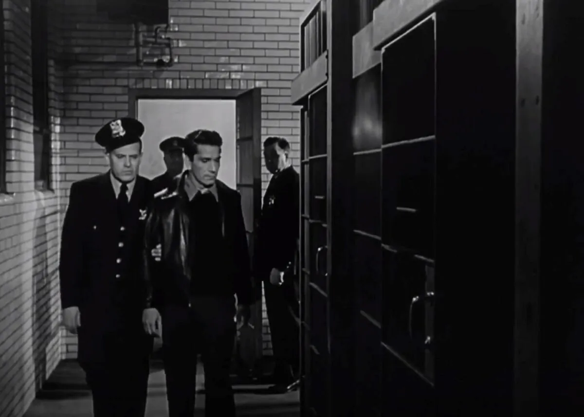 Based on a true story, “Call Northside 777” tells how Frank Wiecek (Richard Conte, in front, R), here escorted by an officer to his cell, is found innocent of murder. (Twentieth Century Fox)