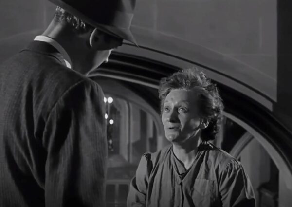 _man talking to old women