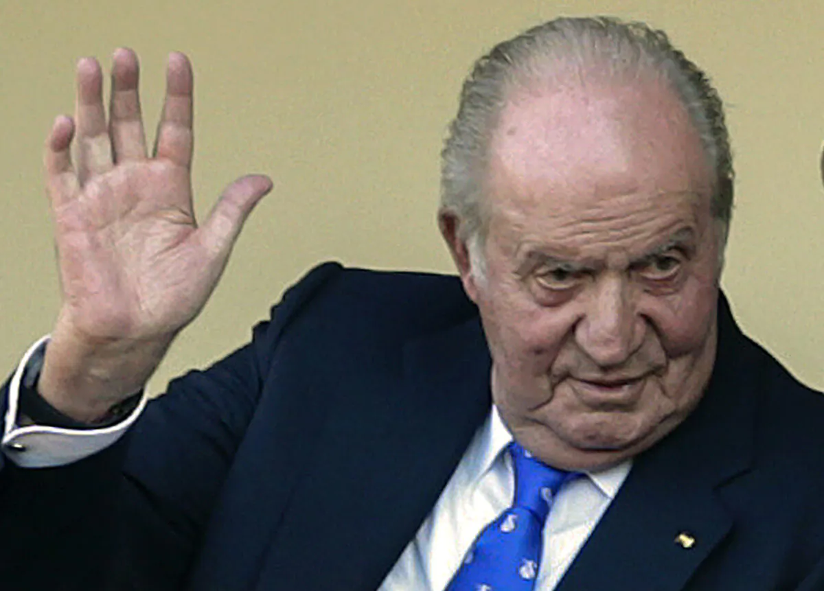 Spain's former King Juan Carlos waves at the bullring in Aranjuez, Spain, on June 2, 2019. (Andrea Comas/AP Photo)