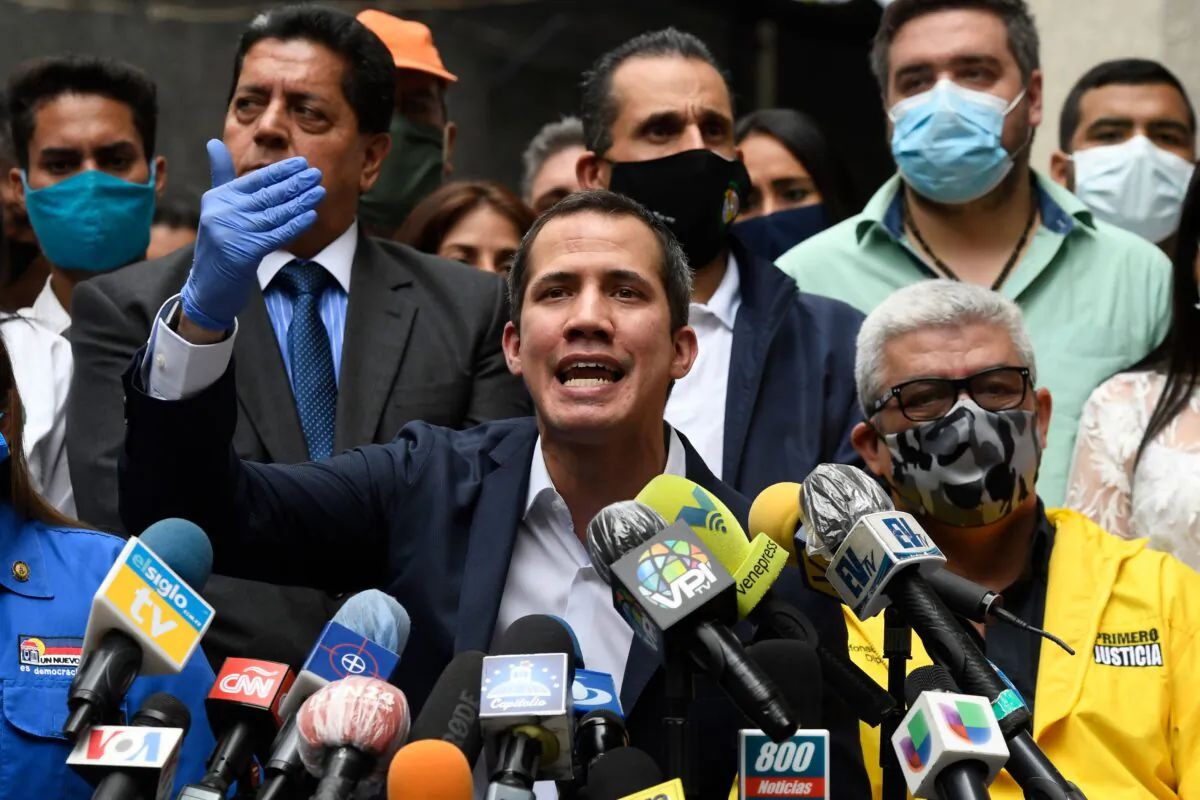 Venezuelan opposition leader and self-proclaimed acting president Juan Guaido delivers a press conference at the headquarters of the Accion Democratica (Democratic Action) party in Caracas on June 17, 2020. (Federico Parra/AFP via Getty Images)