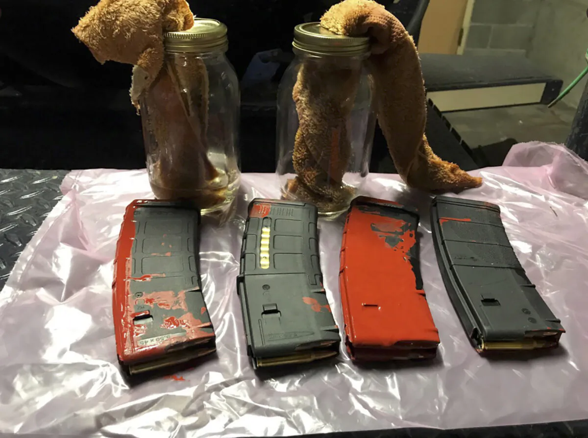 Loaded rifle magazines and Molotov cocktails found at a park in Portland, Ore., on July 26, 2020. (Portland Police Department via AP)
