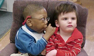 Two Special-Needs Best Friends With Low Life Expectancy Graduate High School Side by Side