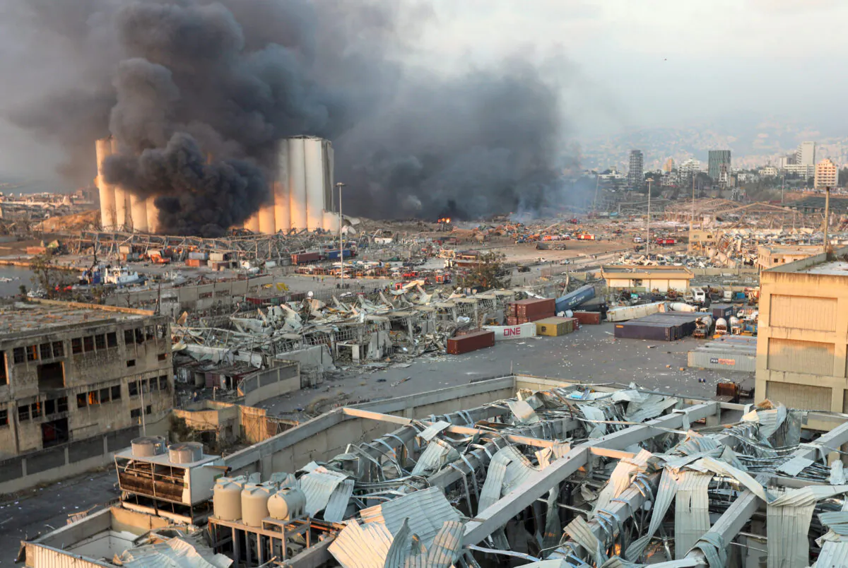 Smoke rises from the site of an explosion in Beirut, Lebanon, on Aug. 4, 2020. (Mohamed Azakir/Reuters)