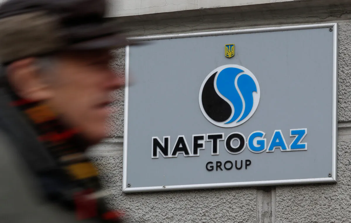 A man walks past the headquarters of the Ukrainian state energy company Naftogaz in central Kiev, Ukraine, on Dec. 2, 2019. (Valentyn Ogirenko/File Photo/Reuters)