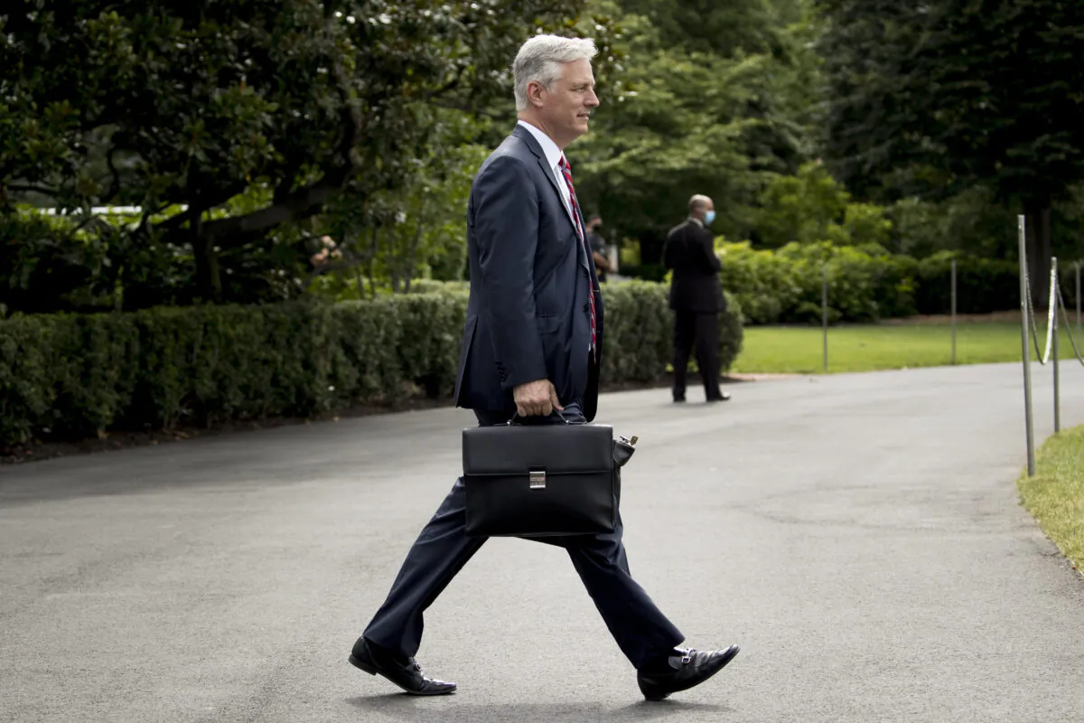 White House national security adviser Robert O'Brien walks on the South Lawn of the White House in Washington on July 10, 2020. (Andrew Harnik/ AP Photo)