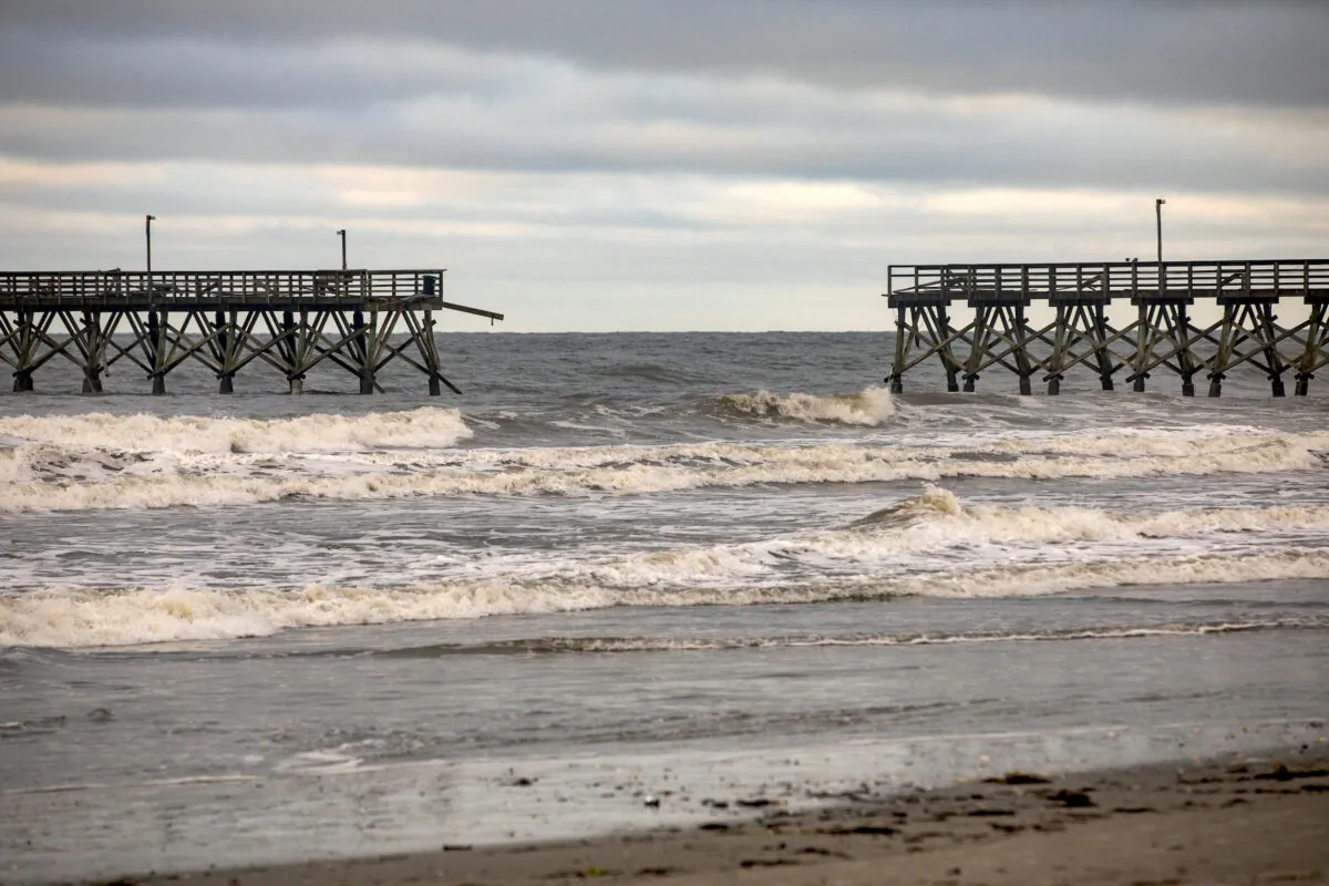 The private Sea Cabins pier is seen damaged following Hurricane Isaias, in North Myrtle Beach, S.C., on Aug. 4, 2020. (Jason Lee/The Sun News via AP)