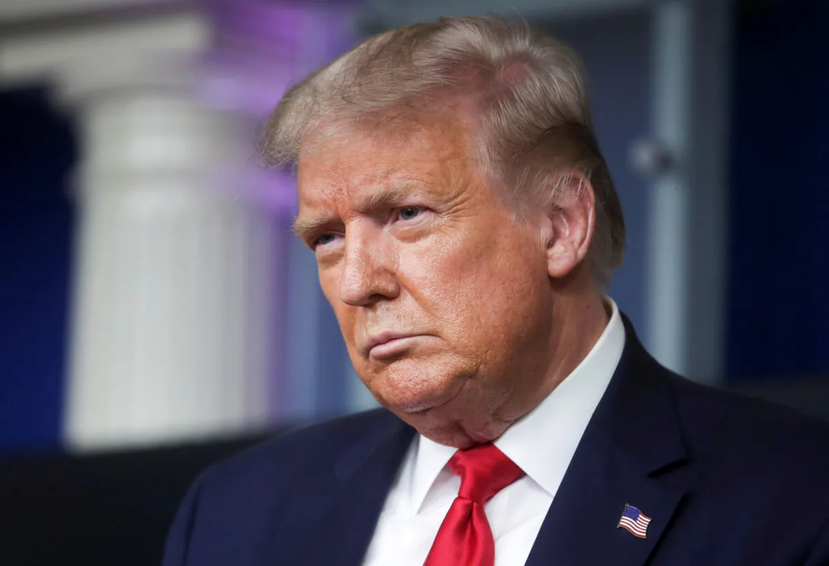 President Donald Trump listens to a question from a reporter during a CCP virus briefing in the Brady Press Briefing Room of the White House in Washington on Aug. 3, 2020. (Jonathan Ernst/Reuters)