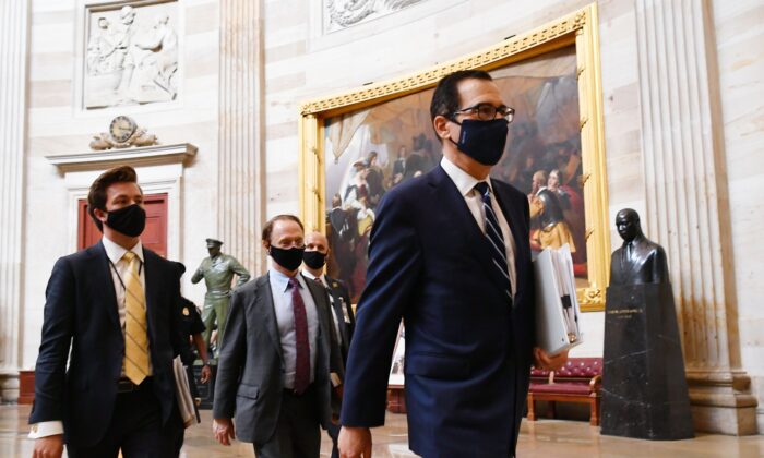 Treasury Secretary Steven Mnuchin heads to a meeting on the CCP virus relief bill at the U.S. Capitol in Washington on Aug. 4, 2020. (Mandel Ngan/AFP via Getty Images)