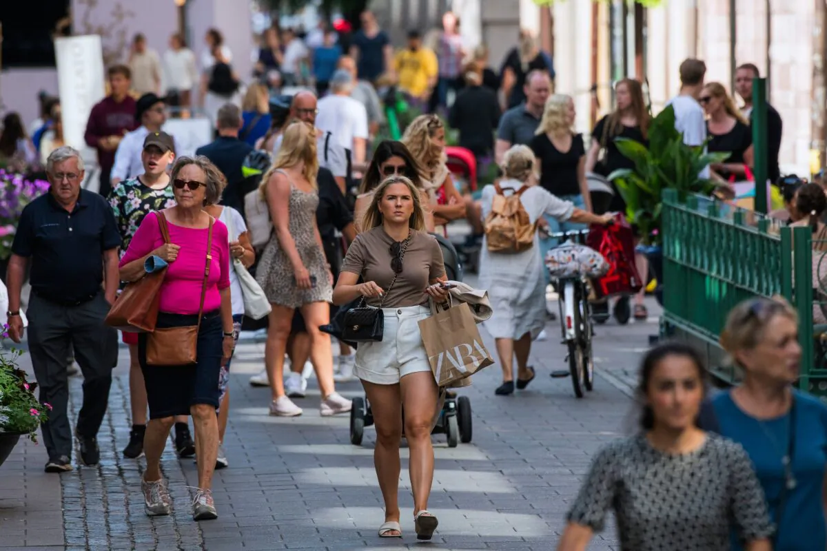 People walk in Stockholm during the novel coronavirus (COVID-19) pandemic on July 27, 2020. (Jonathan Nackstrand/AFP via Getty Images)