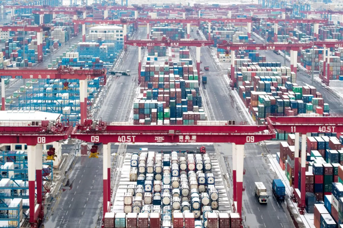 Containers and trucks are seen following a snowfall at the port of Qingdao, Shandong province, China, on Feb. 14, 2019. (Stringer/File/Reuters)