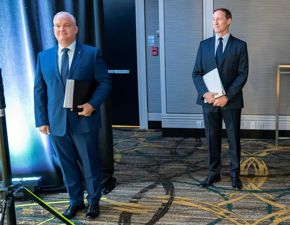 Conservative Party of Canada leadership candidates Erin O'Toole and Peter MacKay wait for the start of the French Leadership Debate in Toronto on June 17, 2020.As the race for Conservative leadership enters its final weeks, new data from Elections Canada offers a glimpse into fundraising efforts of each campaign—and how the battle for donor dollars has tightened in the lead up to the final vote tally. (Frank Gunn/The Canadian Press)