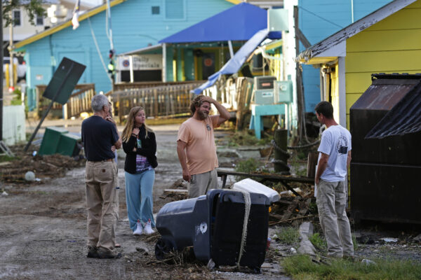 Residents survey the damages