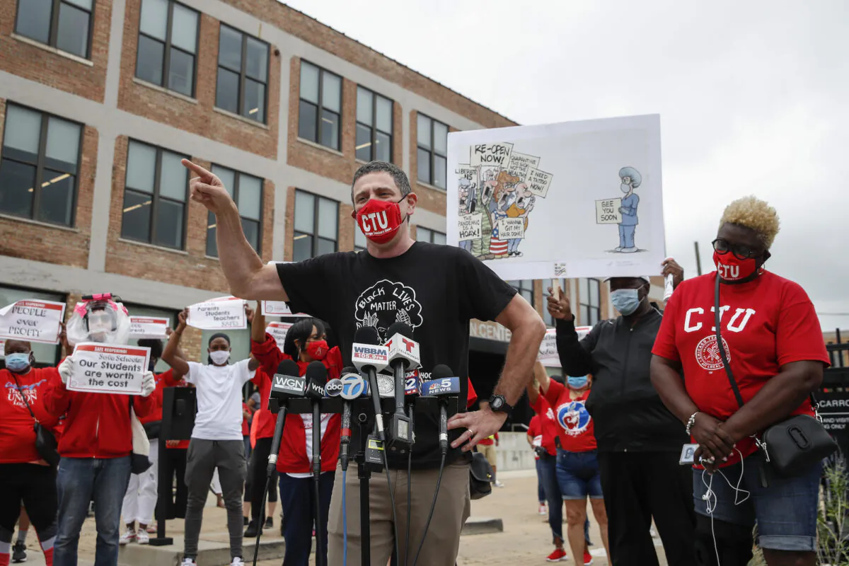 Chicago Teachers Union President Jesse Sharkey speaks prior to a protest over the city's school reopening plan on Aug. 3, 2020. (Kamil Krzaczynski/AFP via Getty Images)