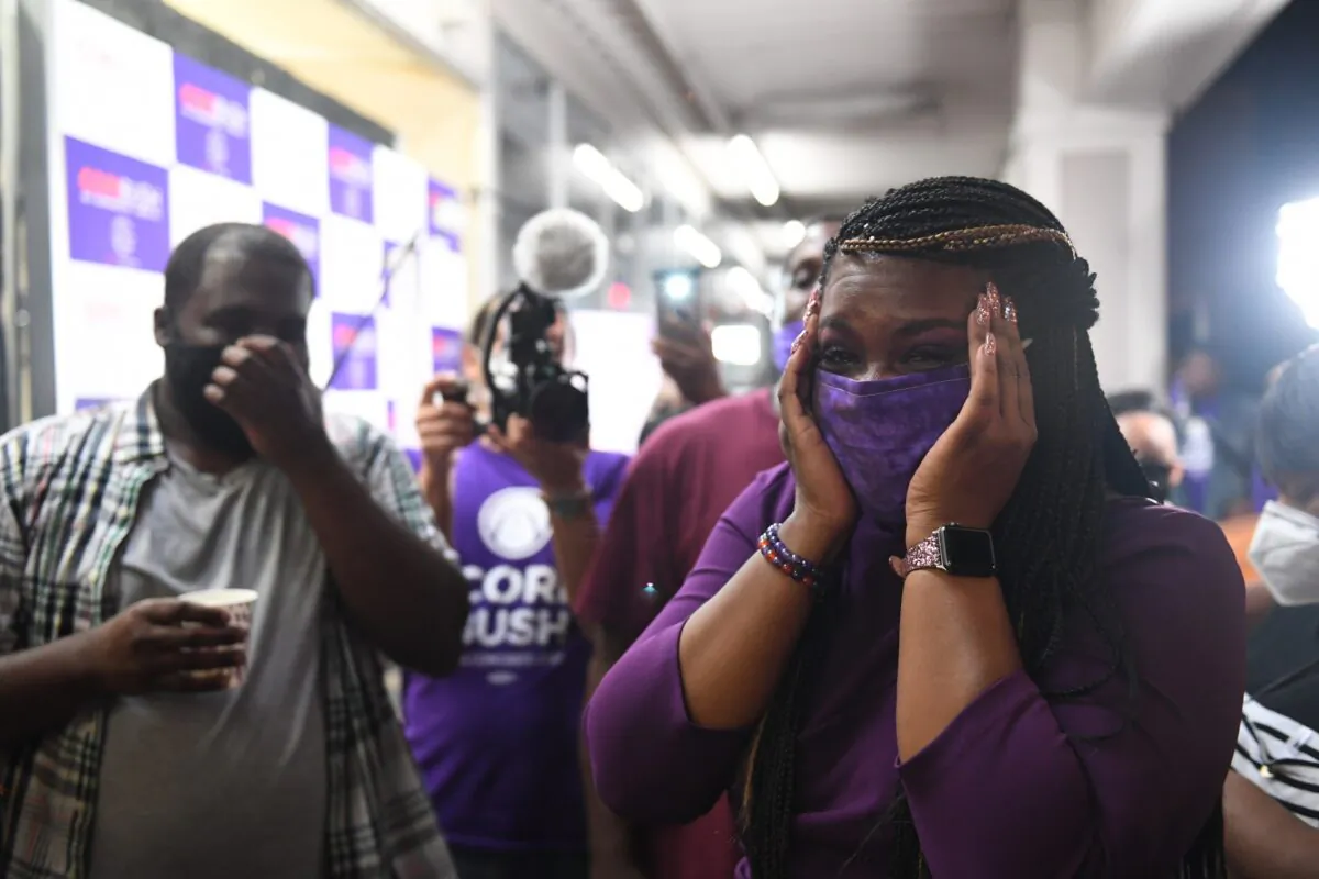 Democratic congressional candidate Cori Bush celebrates with friends and family at her campaign office in St. Louis, Mo., on Aug. 4, 2020. (Michael B. Thomas/Getty Images)