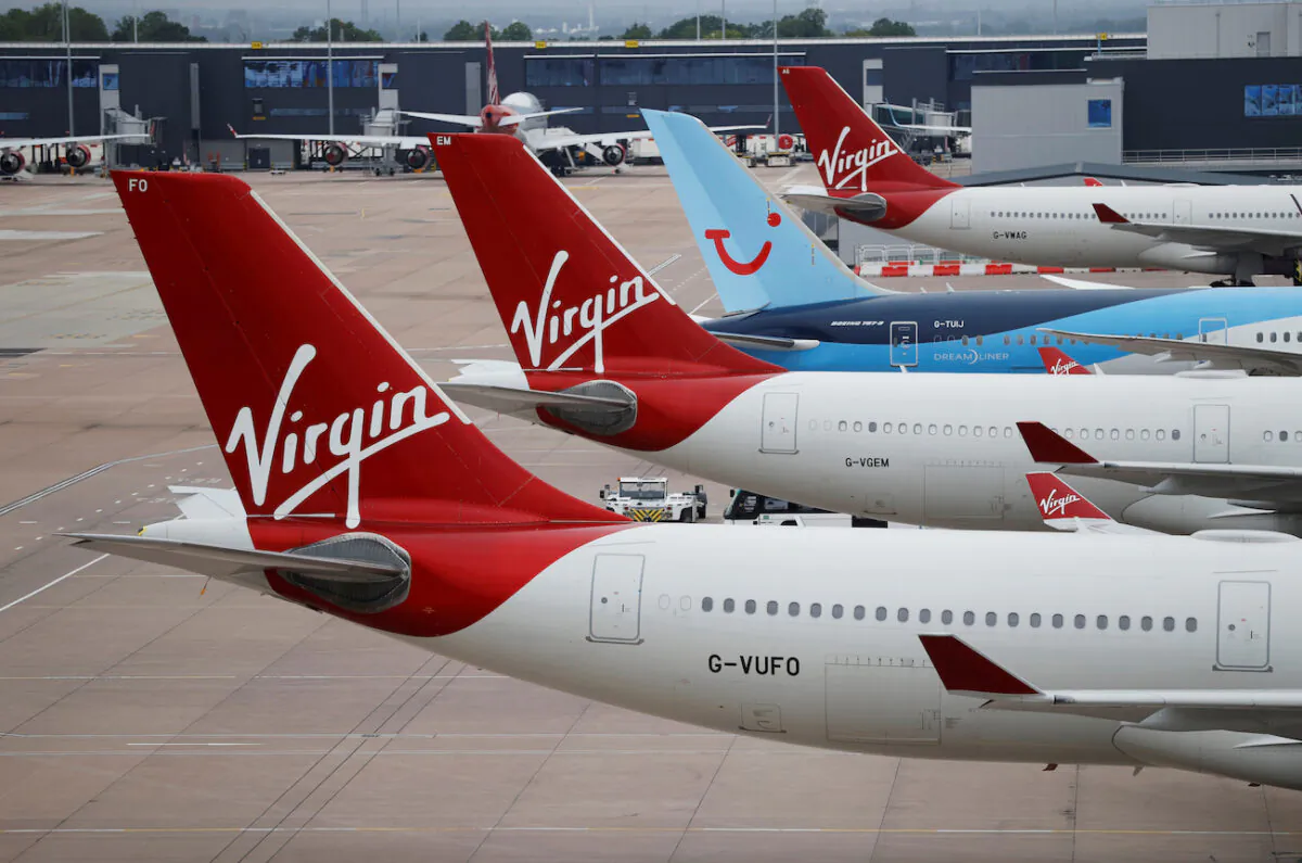 Virgin Atlantic and TUI Airways aircraft at Manchester Airport in Manchester, Britain, on June 8, 2020. (Phil Noble/Reuters)