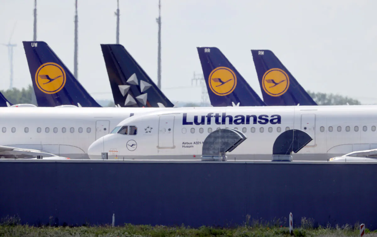 Airplanes of German carrier Lufthansa are parked at the Berlin Schoenefeld airport, amid the spread of the coronavirus disease (COVID-19) in Schoenefeld, Germany, on May 26, 2020. (Fabrizio Bensch/Reuters)